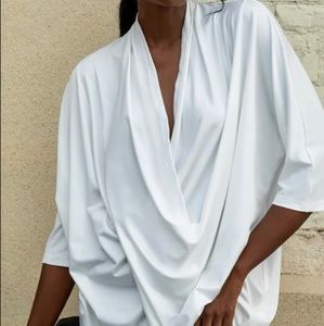 Cotton blend half sleeve deep Vneck solid blouse